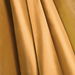 Gold Costume Satin Fabric thumbnail image 1 of 1