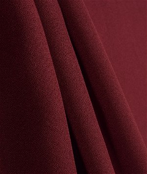 酒红色涤纶绉织物